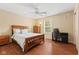 Bedroom features wood floors, a ceiling fan, and closet at 2726 Reflection Way, Greenwood, IN 46143