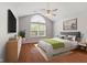 Bright bedroom with vaulted ceiling, ceiling fan, and large arched window overlooking mature trees at 2726 Reflection Way, Greenwood, IN 46143