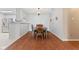 Dining area featuring stylish chandelier, wooden table, and seating at 2726 Reflection Way, Greenwood, IN 46143