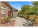 Inviting outdoor patio area with comfortable seating and a beautiful garden view, perfect for relaxation at 2726 Reflection Way, Greenwood, IN 46143