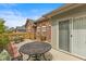 Outdoor patio with table and chairs, perfect for enjoying the backyard at 2726 Reflection Way, Greenwood, IN 46143