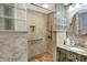 Modern bathroom features a walk-in shower, and granite countertops on the vanity with ample space at 2769 S 800 W, Indianapolis, IN 46239