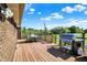 Lovely wooden deck with a grill and patio furniture, ideal for outdoor relaxation and entertaining at 2769 S 800 W, Indianapolis, IN 46239