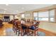 Large dining room with a wooden table set, bay window, and view into living room at 2769 S 800 W, Indianapolis, IN 46239