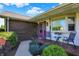 Inviting front porch with seating and a 'Welcome' sign at 2769 S 800 W, Indianapolis, IN 46239