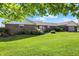 Charming brick home with lush green lawn and well-manicured landscaping at 2769 S 800 W, Indianapolis, IN 46239