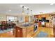 Open concept kitchen with a large island, cooktop, and breakfast bar at 2769 S 800 W, Indianapolis, IN 46239