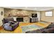 Cozy living room with a stone fireplace, comfortable seating, and warm lighting, perfect for relaxation and entertainment at 2769 S 800 W, Indianapolis, IN 46239