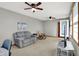 Simple living room with ceiling fans and carpeting; ready for someone to make it their own at 2769 S 800 W, Indianapolis, IN 46239