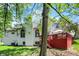 Backyard view highlighting the deck, mature trees, and exterior architecture at 3162 Hazel Foster Dr, Carmel, IN 46033