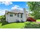 Lush backyard showcasing the home's exterior and a glimpse of the inviting deck at 3162 Hazel Foster Dr, Carmel, IN 46033