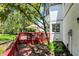 Backyard red deck offers an outdoor dining space at 3162 Hazel Foster Dr, Carmel, IN 46033
