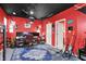 Basement workspace with multiple monitors, guitars, and ample shelving at 3162 Hazel Foster Dr, Carmel, IN 46033