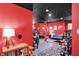 Finished basement offers vibrant red walls and dark ceilings at 3162 Hazel Foster Dr, Carmel, IN 46033