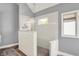 This bathroom features a step-in shower with white tile and hexagon-shaped floor tiles at 3162 Hazel Foster Dr, Carmel, IN 46033
