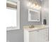 This bathroom has a bright window, a large mirror, and under-sink storage at 3162 Hazel Foster Dr, Carmel, IN 46033