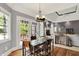 Comfortable dining room with hardwood floors and natural light, creating an inviting space for gatherings at 3162 Hazel Foster Dr, Carmel, IN 46033