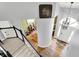Bright foyer with hardwood floors, white trim, modern chandelier, and staircase with black banister at 3162 Hazel Foster Dr, Carmel, IN 46033
