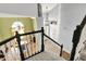 A top-down view of the foyer features an ornate chandelier and hardwood floors at 3162 Hazel Foster Dr, Carmel, IN 46033