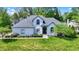 Beautifully landscaped front yard featuring a two-story home with a well-maintained lawn at 3162 Hazel Foster Dr, Carmel, IN 46033
