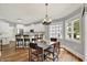 Bright kitchen with eat in dining area, white cabinets, stainless steel appliances, and granite countertops at 3162 Hazel Foster Dr, Carmel, IN 46033