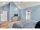 This main bedroom features vaulted ceilings, wood floors and trim, and soft, warm colors at 3162 Hazel Foster Dr, Carmel, IN 46033