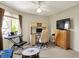 Bright office/flex space features an organized desk area and a television for all your needs at 3162 Hazel Foster Dr, Carmel, IN 46033