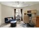 Bright office/flex space features an organized desk area and a comfortable blue couch at 3162 Hazel Foster Dr, Carmel, IN 46033