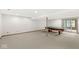 Basement featuring neutral carpet and walk out access to the backyard at 320 Thornberry Dr, Carmel, IN 46032