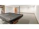 Finished basement featuring neutral carpet and door access at 320 Thornberry Dr, Carmel, IN 46032