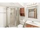 Bathroom showcasing a glass-enclosed shower, vanity, and matching fixtures at 320 Thornberry Dr, Carmel, IN 46032