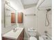Bathroom featuring vanity with storage, ample lighting, and shower-tub combo at 320 Thornberry Dr, Carmel, IN 46032