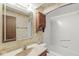 Bathroom features a shower/tub combo, vanity, and decorative mirror at 320 Thornberry Dr, Carmel, IN 46032