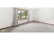 Cozy bedroom with neutral carpet, large window, and plenty of natural light at 320 Thornberry Dr, Carmel, IN 46032