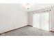Bright bedroom with sliding glass doors and neutral carpet at 320 Thornberry Dr, Carmel, IN 46032