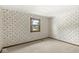 Charming bedroom with wallpaper, offering a bright and inviting space at 320 Thornberry Dr, Carmel, IN 46032