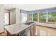 Bright kitchen features a sink with an island and large windows at 320 Thornberry Dr, Carmel, IN 46032