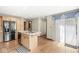 Spacious kitchen features a sink with an island and stainless steel appliances at 320 Thornberry Dr, Carmel, IN 46032