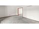 Spacious carpeted living room with ample space and natural light at 320 Thornberry Dr, Carmel, IN 46032