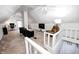 Spacious bonus room with vaulted ceilings, multiple sitting areas, and ample natural light at 329 W Hampton Dr, Indianapolis, IN 46208