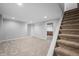 Spacious finished basement with carpeting, recessed lighting, and stairs leading to other floors at 3505 Autumn Ct, Columbus, IN 47203
