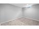A finished basement area with carpet and a small window allowing natural light at 3505 Autumn Ct, Columbus, IN 47203