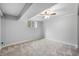 Finished basement area with a window, carpet and a ceiling fan at 3505 Autumn Ct, Columbus, IN 47203
