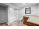 Bathroom with a vanity, toilet, shower and tub combo and a decorative mirror at 3505 Autumn Ct, Columbus, IN 47203
