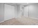Bedroom with plush carpeting, closet, and a doorway leading to another room at 3505 Autumn Ct, Columbus, IN 47203