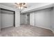 Bedroom view featuring a closet, ceiling fan, and doorway leading to the other room at 3505 Autumn Ct, Columbus, IN 47203