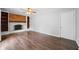 Living room area with built-in shelving and fireplace, with hardwood floors at 3505 Autumn Ct, Columbus, IN 47203