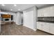 Open floor plan connecting the kitchen to the living room with a fireplace at 3505 Autumn Ct, Columbus, IN 47203
