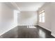 Bedroom with dark wood floors, neutral walls, one window providing natural light at 355 E Ohio St # 314, Indianapolis, IN 46204