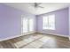 Bright bedroom with French doors and large window, showcasing ample natural light and wood floors at 355 E Ohio St # 314, Indianapolis, IN 46204